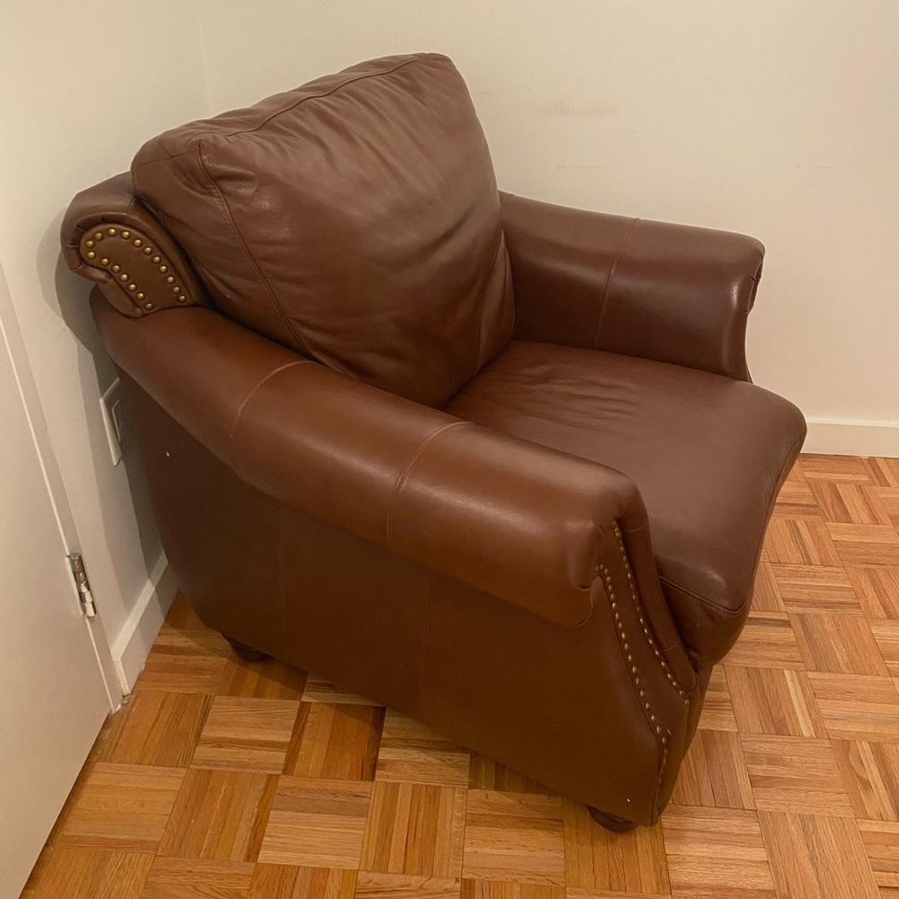 Bernie and Phyls leather accent armchair.